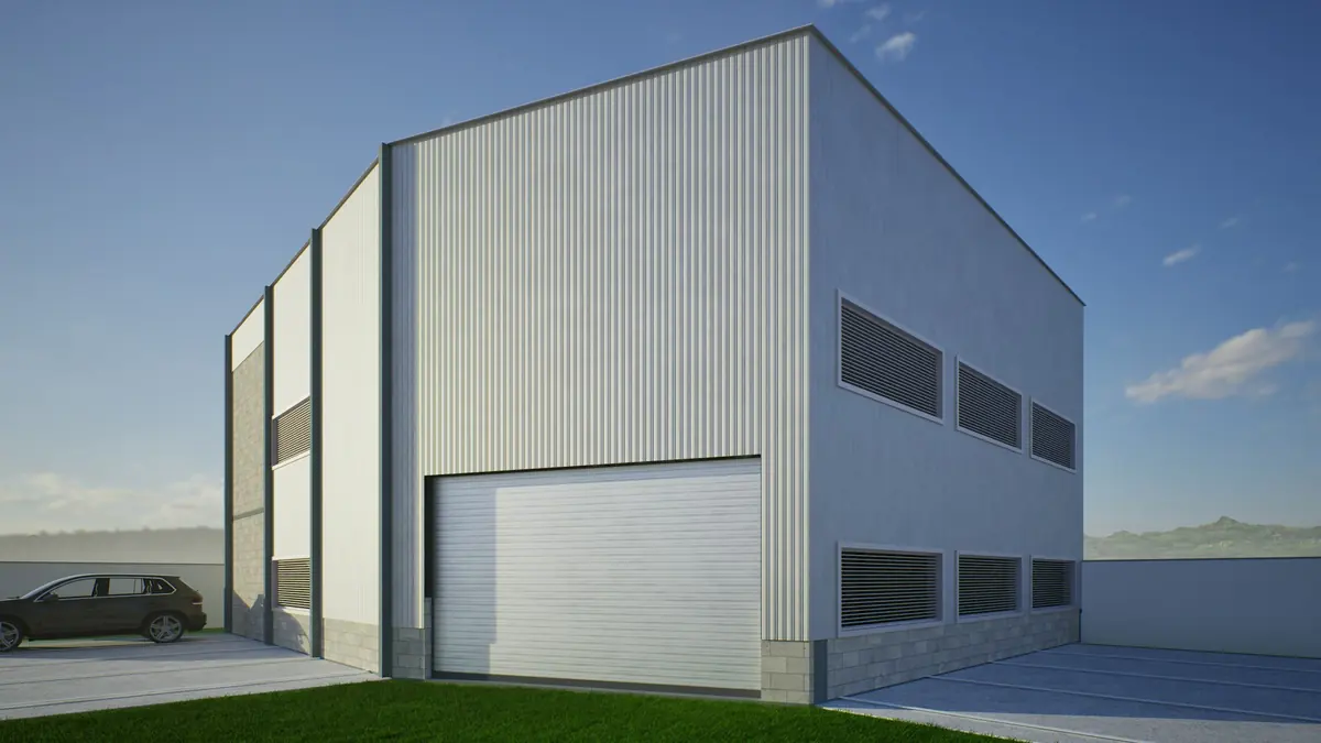 Edificio industrial moderno con una gran puerta de acceso